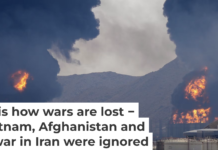 Plumes of smoke and fire rise after debris from an intercepted Iranian drone struck an oil facility, according to authorities, in Fujairah, United Arab Emirates, on March 14, 2026. AP Photo/Altaf Qadri